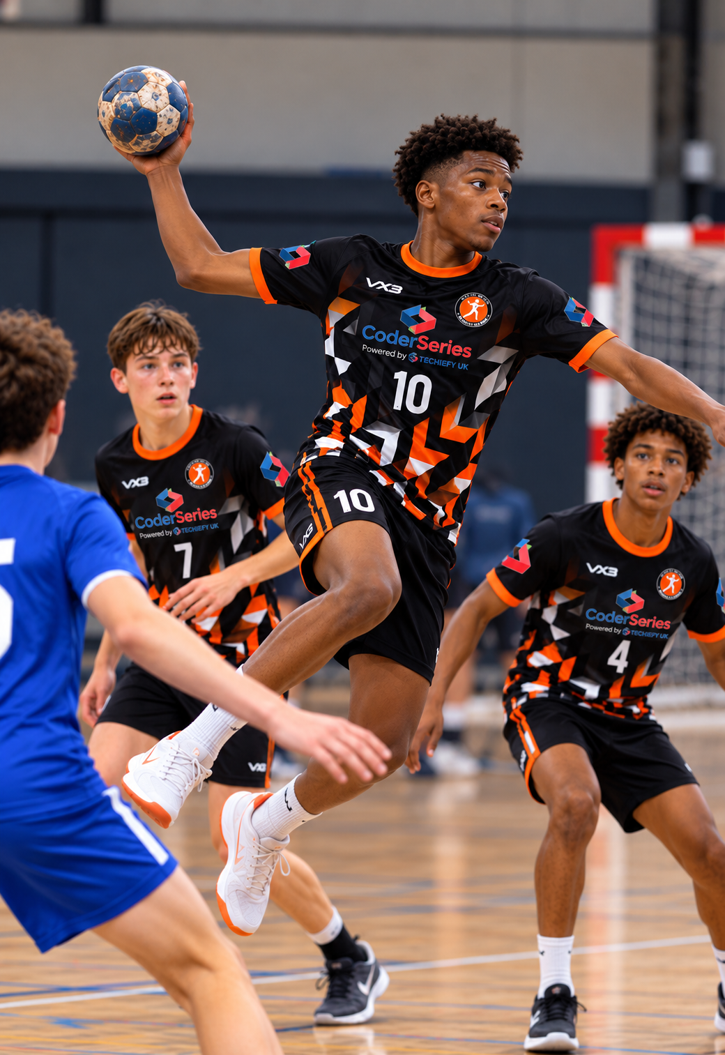 Trafford Handball Club player in action alongside young people exploring technology